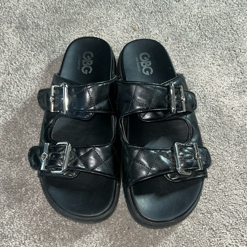 Women’s 7 1/2 black slide sandals. Pre-loved.